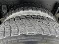 Close-up of a tire from a 2017 International WorkStar 7600 showcasing rugged tread patterns designed for heavy-duty performance