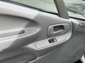 Interior door handle and window control of a 2004 Toyota Toyoace