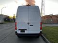 A 2019 Mercedes-Benz Sprinter van viewed from the rear with a white exterior and no visible license plate