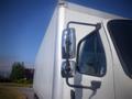 A 2016 Freightliner M2 106 Medium Duty truck with a white cargo box and chrome side mirrors