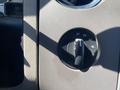 A control knob for a 2013 Ford Expedition indicating various drive settings including 2H 4A 4H and 4L
