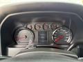 Dashboard of a 2018 Chevrolet Silverado 1500 displaying speedometer tachometer and engine hours with illuminated gauges