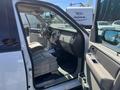 Interior view of a 2013 Ford Expedition showing the driver's seat dashboard and steering wheel