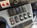 Control panel of a 2020 Chevrolet Express featuring buttons for doors interior lights fan and various other functions