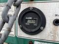 Close-up of a black hour meter displaying 13640 hours on a control panel for a 2011 Hightliner Aquacide Hot Water Weed Control Dual Flat Deck Trailer