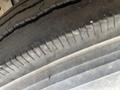 Close-up of a tire from a 2008 Newmar Canyon Star 36 Foot Class A Motorhome showing tread patterns and grooves