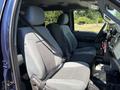 Interior view of a 2014 Ford F-250 SD showing two front bucket seats with seatbelts in place and a dashboard partially visible