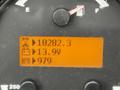 Display panel of a 2014 Caterpillar TL1055C showing hours operated at 10282.3 fuel level at 13.9 and RPM at 979