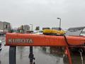 A 2012 Kubota F3680 with an orange frame and a yellow light bar mounted on top displaying the number 12K697