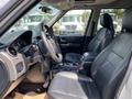 Interior of a 2006 Land Rover LR3 showing the front seats steering wheel and dashboard with leather upholstery and standard controls