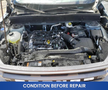 The engine compartment of a 2023 Ford Bronco Sport with visible components including the engine block battery and various fluids