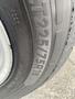 Close-up view of a tire with the specifications LT 225/75R16 prominently displayed