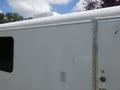 A 2004 Royal 18 Foot Office Trailer with a white exterior and a metal door visible on the side