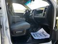 Interior view of a 2014 RAM 5500 showing the driver's seat dashboard and floor mat with the text Thank You