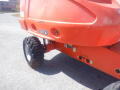 A 2008 JLG Boom Lift model 400S with large rubber tires and a distinctive orange body