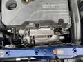 Close-up of a 2022 Chevrolet Equinox engine featuring the EcoTec branding and various components including the intake manifold and electrical connectors