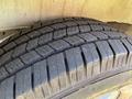 Close-up of a tire from a 2023 Mercedes-Benz Sprinter showcasing detailed tread patterns and grooves