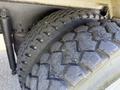 Close-up of the dual rear tires of a 2009 International 7500 showcasing tread patterns and sidewall details
