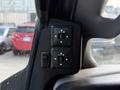 Switch panel for adjusting side mirrors in a 2020 Chevrolet Express with directional controls and a single toggle switch