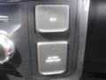 Interior controls of a 2022 Ford F-150 featuring two power outlets labeled 12 V and AC 120V 400W MAX