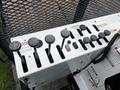 Control panel featuring various levers and buttons used in a 2008 International 7500 vehicle