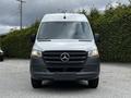 A 2020 Mercedes-Benz Sprinter van viewed from the front with a prominent logo on the grille and a large windshield