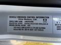 A label detailing vehicle emission control information for a Hino 338 truck including vehicle family name regulatory sub-category and emission control system