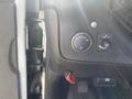 Control panel of a 2020 Chevrolet Express featuring headlight adjustment and dashboard illumination controls