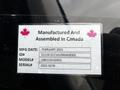 2021 Ford F-550 label featuring details such as manufacturing date ID model and serial number with Canadian flags