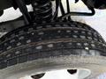 Close-up of a tire on a 2012 Ford F-450 SD showing the tread pattern and sidewall details