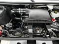 A close-up view of the engine compartment of a 2019 Mercedes-Benz Sprinter showing the air intake and various hoses and components