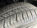 Close-up of a textured tire tread from a 2018 Ford F-150 showing detailed grooves and wear patterns