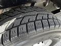 Close-up of a tire on a 2020 Mercedes-Benz Sprinter featuring a patterned tread designed for traction and stability