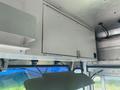 Interior view of a 2007 Morgan Olson Workhorse W42 showing a closed overhead storage compartment and a partially visible driver's sun visor