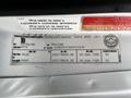 2006 GMC C5000 vehicle identification label with specifications including tire size and manufacturer information