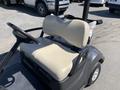 A 2019 Yamaha G29 E Electric G29 Golf Car with a beige seat and a black steering wheel