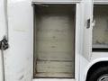 A 2017 Ford F-350 SD with an open cargo area revealing a clean, empty space without any equipment or materials inside