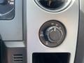 Control dial for four-wheel drive settings in a 2012 Ford F-150