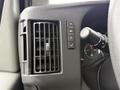 2008 Chevrolet Express dashboard with air vent and control buttons for lights and wipers