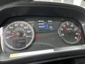 Dashboard of a 2020 Hino 338 showing speedometer fuel gauge and digital display with average speed and time information