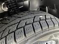 Close-up of a tire from a 2020 Mercedes-Benz Sprinter showcasing a detailed tread pattern designed for traction and stability