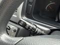 The image shows the control stalk of a 2009 Toyota Hiace featuring settings for windshield wipers with labels for pull rear mist and intermittent options