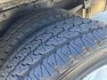 Close-up of the tire tread on a 2019 Freightliner MT45 showcasing the deep grooves and patterns designed for traction and stability