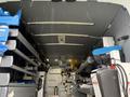 Interior of a 2023 Ford Transit van showcasing organized storage shelves and equipment neatly arranged for easy access
