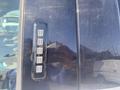 Close-up of the door keypad on a black 2017 Ford F-150 featuring numbered buttons ranging from 1 to 0