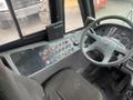 Interior view of a 2007 Freightliner B2 showing the dashboard with various controls and a steering wheel