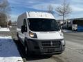 A 2017 RAM Promaster van with a white exterior parked on a snowy street