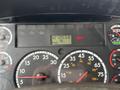 Dashboard of a 2015 Freightliner M2 106 displaying odometer reading of 1272038 kilometers and various gauges for speed fuel and engine functions