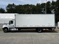 A 2019 International 4300 truck with a white box cargo area is displayed in profile on a paved surface