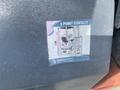 A sticker on equipment showing a safety graphic for a forklift demonstrating the 3 point contact rule